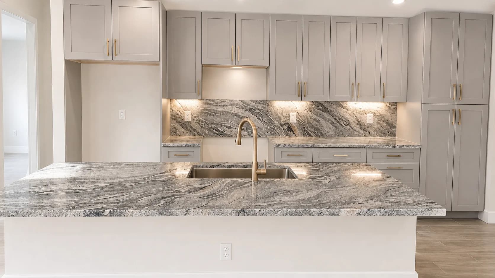 Bookmatched natural stone countertop and backsplash